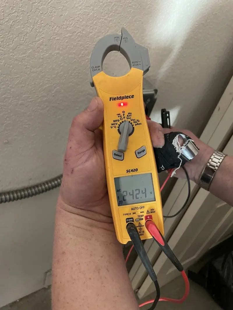 Voltage testing with clamp meter during Generator Installation in Pembroke